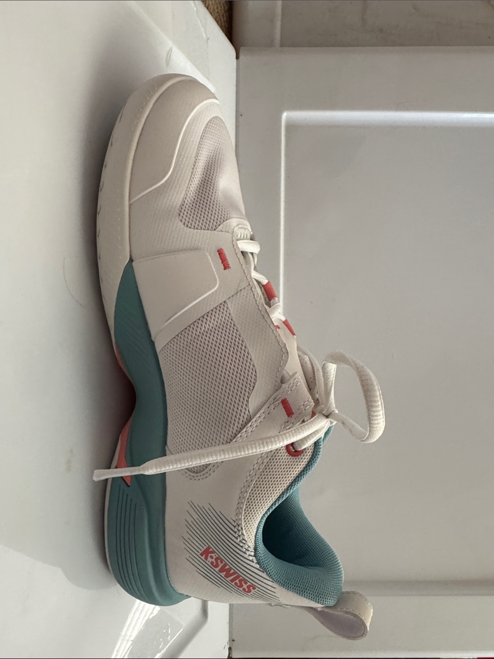 K-Swiss Women's White Athletic Shoe with Teal and Coral Accents